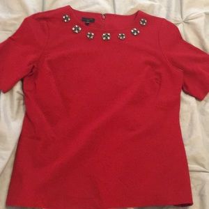 Red shirt with jeweled neckline
